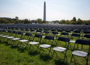 WASHINGTON, DC - OCTOBER 04: Empty chairs are on display to represent the 200,000 lives lost due to Covid-19 at he National Covid-19 Remembrance on the ellipse, behind the White House on October 04, 2020 in Washington, DC.President Donald Trump was admitted to Walter Reed Medical center after testing positive for COVID-19.