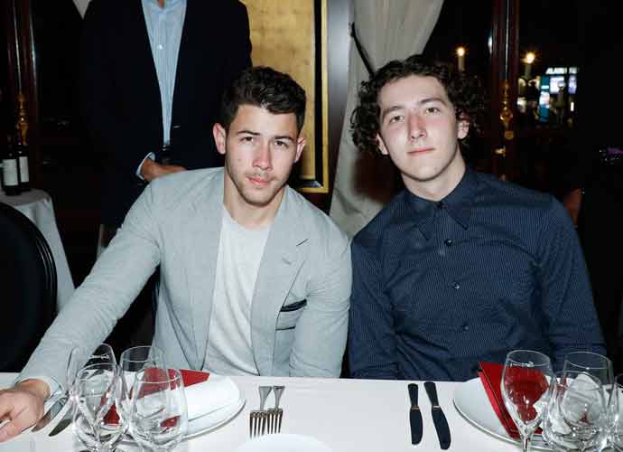 PARIS, FRANCE - SEPTEMBER 24 : Singers Nick Jonas and Frankie Jonas (Jonas Brothers ) attend 