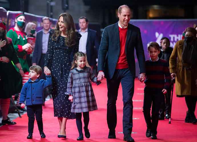 LONDON, ENGLAND - DECEMBER 11: Prince William, Duke of Cambridge and Catherine, Duchess of Cambridge with their children, Prince Louis, Princess Charlotte and Prince George, attend a special pantomime performance at London's Palladium Theatre, hosted by The National Lottery, to thank key workers and their families for their efforts throughout the pandemic on December 11, 2020 in London, England.