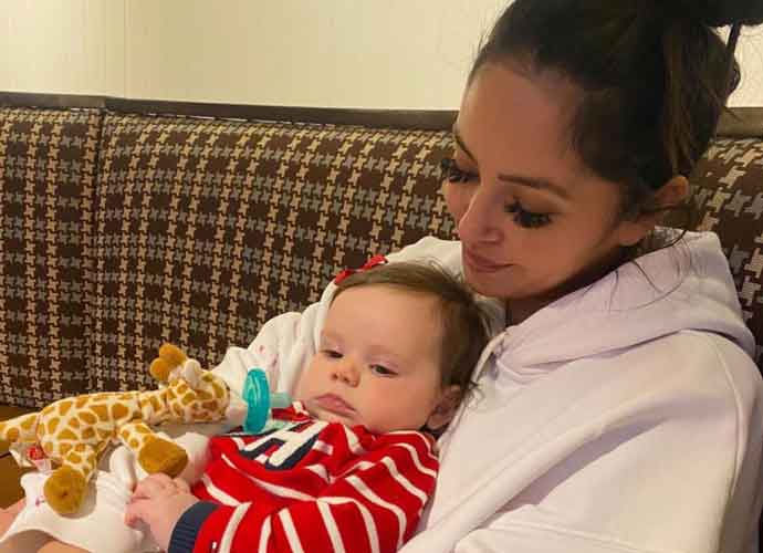 Vanessa Bryant Cuddles Goddaughter Named After Her Late Daughter Gigi On Anniversary Crash (Photo: Instagram)