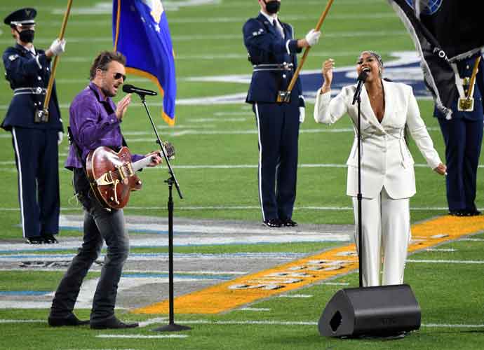 TAMPA, FLORIDA - FEBRUARY 07: (L-R) Eric Church and Jazmine Sullivan perform during the Super Bowl LV Pregame at Raymond James Stadium on February 07, 2021 in Tampa, Florida. (Photo by Kevin Mazur/Getty Images for TW)