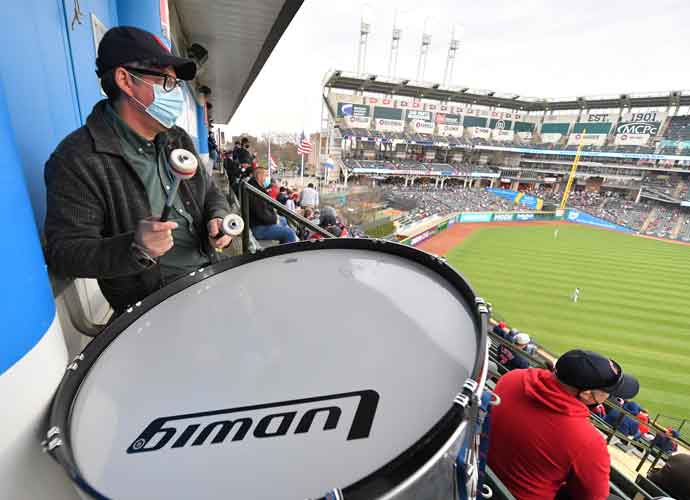 CLEVELAND, OHIO - APRIL 05: Patrick Carney, drummer for the rock duo Black Keys, stands in for Cleveland Indians legendary drummer John Adams during the fourth inning of the home opener against the Kansas City Royals at Progressive Field on April 05, 2021 in Cleveland, Ohio. (Photo by Jason Miller/Getty Images)