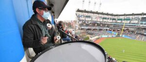 CLEVELAND, OHIO - APRIL 05: Patrick Carney, drummer for the rock duo Black Keys, stands in for Cleveland Indians legendary drummer John Adams during the fourth inning of the home opener against the Kansas City Royals at Progressive Field on April 05, 2021 in Cleveland, Ohio. (Photo by Jason Miller/Getty Images)