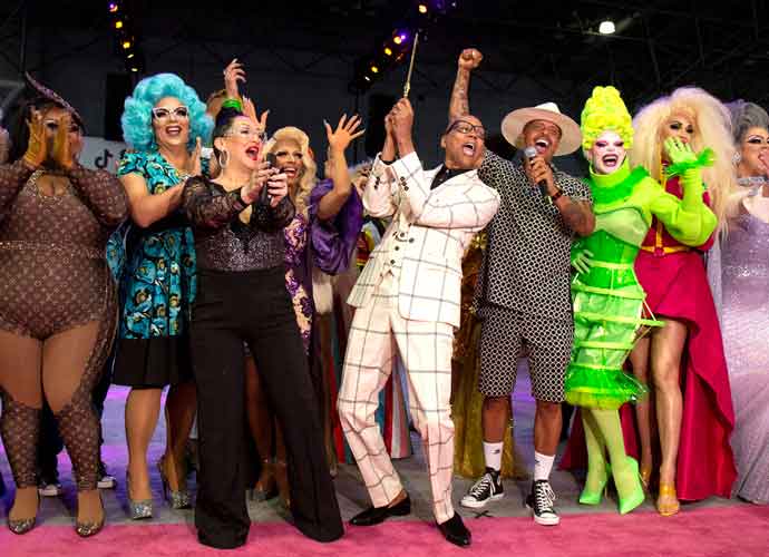 NEW YORK, NEW YORK - SEPTEMBER 07:RuPaul (C) cuts the ribbon as Michelle Visage, Jamal Sims, Mrs. Kasha Davis, Art SImone, Yvie Oddly, Brooklyn Hytes and Nina West look on during RuPaul's DragCon 2019 at The Jacob K. Javits Convention Center on September 07, 2019 in New York City. (Photo by Santiago Felipe/Getty Images)