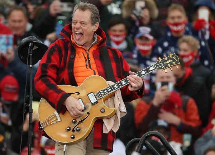 LANSING, MICHIGAN - OCTOBER 27: Entertainer and Michigan native Ted Nugent -- also known as the Motor City Madman -- performs the Star Spangled Banner during a campaign rally for U.S. President Donald Trump at Capital Region International Airport October 27, 2020 in Lansing, Michigan. With one week until Election Day, Trump is campaigning in Michigan, a state he won in 2016 by less than 11,000 votes, the narrowest margin of victory in the state's presidential election history. (Photo by Chip Somodevilla/Getty Images)