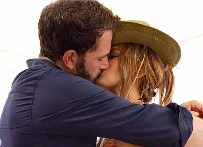 Jennifer Lopez and Ben Affleck kiss (Image: Getty)