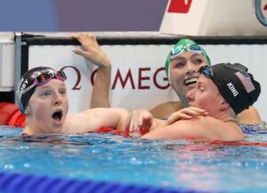 TOKYO, JAPAN - JULY 27: Lydia Jacoby of United States celebrates with team mate Lilly King after winning the Women's 100m Breaststroke on day four of the Tokyo 2020 Olympic Games at Tokyo Aquatics Centre on July 27, 2021 in Tokyo, Japan. (Photo by Ian MacNicol/Getty Images)