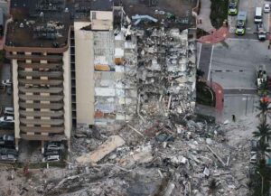 SURFSIDE, FLORIDA - JUNE 24: Search and Rescue personnel work after the partial collapse of the 12-story Champlain Towers South condo building on June 24, 2021 in Surfside, Florida. It is unknown at this time how many people were injured as search-and-rescue effort continues with rescue crews from across Miami-Dade and Broward counties. (Photo by Joe Raedle/Getty Images)