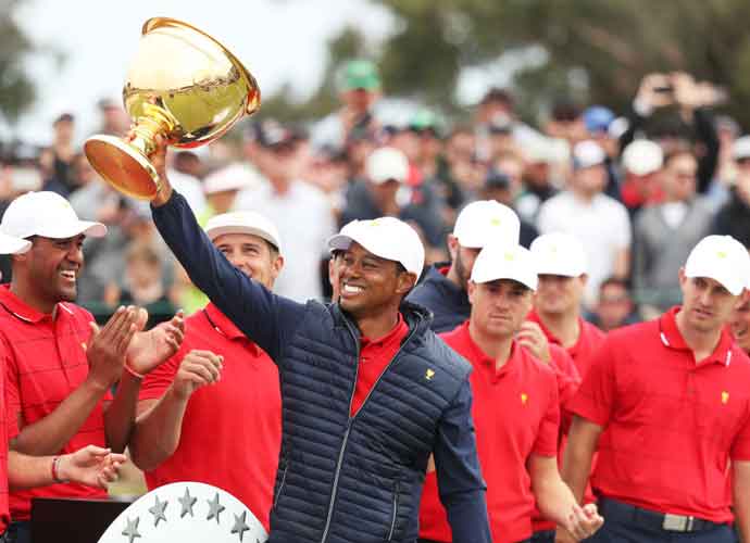 MELBOURNE, AUSTRALIA - DECEMBER 15: Playing Captain Tiger Woods and the United States team celebrate with the cup after they defeated the International team 16-14 during Sunday Singles matches on day four of the 2019 Presidents Cup at Royal Melbourne Golf Course on December 15, 2019 in Melbourne, Australia. (Image: Getty)