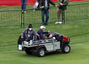 KOHLER, WISCONSIN - SEPTEMBER 23: Tom Felton is carted off the course after collapsing during the celebrity matches ahead of the 43rd Ryder Cup at Whistling Straits on September 23, 2021 in Kohler, Wisconsin. (Photo by Richard Heathcote/Getty Images)