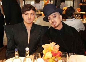 LONDON, ENGLAND - OCTOBER 25: Vangelis Polydorou and Boy George attend an exclusive lunch celebrating the opening of 'Bowie 75', the David Bowie store on Heddon Street, officially beginning the celebrations of Bowie's upcoming 75th birthday, in The Ziggy Bar at Hotel Cafe Royal on October 25, 2021 in London, England. (Photo by David M. Benett/Dave Benett/Getty Images for Bowie 75)