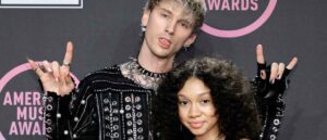 LOS ANGELES, CALIFORNIA - NOVEMBER 21: Machine Gun Kelly, winner of the Favorite Rock Artist award, poses with Casie Colson Baker in the Press Room at the 2021 American Music Awards at Microsoft Theater on November 21, 2021 in Los Angeles, California. (Photo by Amy Sussman/Getty Images)