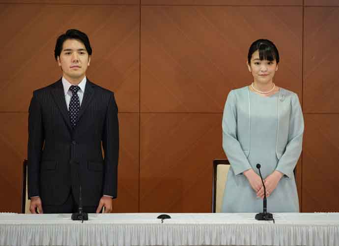 TOKYO, JAPAN - OCTOBER 26: Princess Mako, the elder daughter of Prince Akishino and Princess Kiko, and her husband Kei Komuro, a university friend of Princess Mako, pose during a press conference to announce their wedding at Grand Arc Hotel on October 26, 2021 in Tokyo, Japan. Princess Mako married Kei Komuro today at a registry office following a relationship beset with controversy following the revelation that Mr Komuro’s mother was embroiled in a financial dispute with a former fiancé. Following the wedding, Mako will renounce her royal entitlements and move with Komuro to New York. (Photo by Nicolas Datiche - Pool/Getty Images)