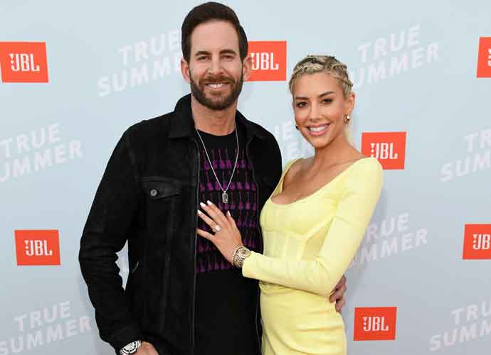 SANTA MONICA, CALIFORNIA - JULY 08: (L-R) Tarek El Moussa and Heather Rae Young walk the red carpet at the JBL True Summer event. The exclusive event featured performances by DJ Sophia Eris, Bebe Rexha, and Jason Derulo. JBL is celebrating the return of live music with a donation to the National Independent Venue Association’s (NIVA) #SaveOurStages initiative. (Photo by Kevin Mazur/Getty Images for JBL)