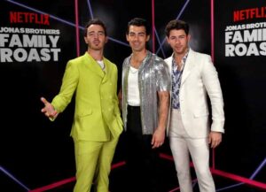 LOS ANGELES, CALIFORNIA - NOVEMBER 23: In this image released on November 23, 2021, (L-R) Kevin Jonas, Joe Jonas and Nick Jonas attend the Jonas Brothers Family Roast Netflix Comedy Special Taping at CBS Television City in Los Angeles, California. (Photo by Phillip Faraone/Getty Images for Netflix)