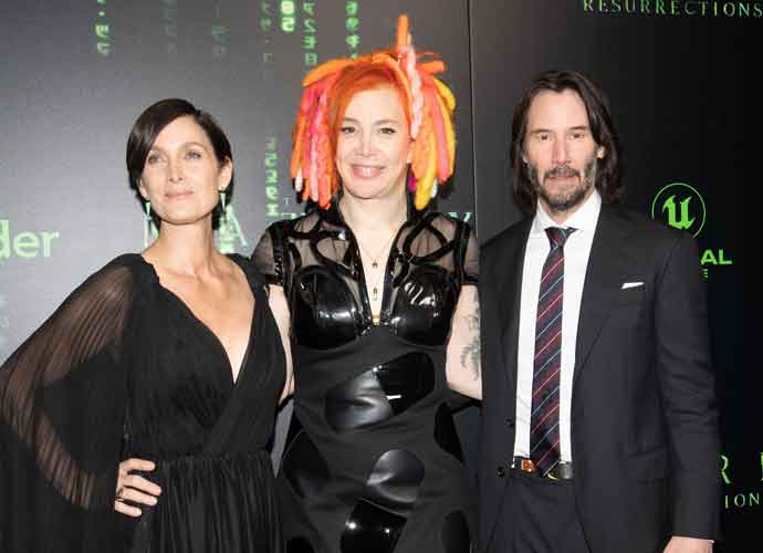 SAN FRANCISCO, CALIFORNIA - DECEMBER 18: (L-R) Carrie-Anne Moss, Lana Wachowski, and Keanu Reeves attend 