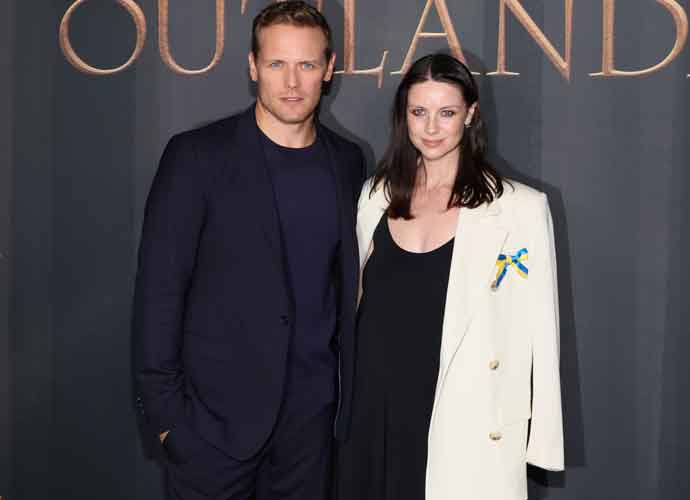NORTH HOLLYWOOD, CALIFORNIA - MARCH 09: Sam Heughan and Caitriona Balfe attend the Season 6 Premiere of STARZ 