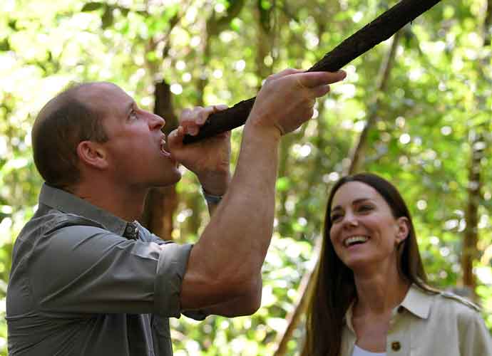 CHIQUIBUL, BELIZE - MARCH 21: Prince William, Duke of Cambridge and Catherine, Duchess of Cambridge drink water collected from a vine during a visit to the British Army Training Support Unit (BATSUB) jungle training facility on the third day of a Platinum Jubilee Royal Tour to the Caribbean on March 21, 2022 in Chiquibul, Belize. The Royal couple are on the first leg of a Caribbean Tour that takes them to Belize, Jamaica and The Bahamas. (Photo by Toby Melville - Pool/Getty Images)