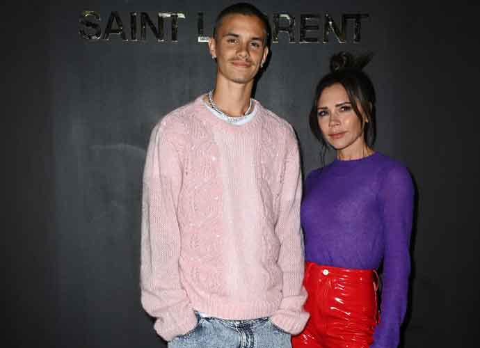 PARIS, FRANCE - MARCH 01: (EDITORIAL USE ONLY - For Non-Editorial use please seek approval from Fashion House) Romeo Beckham and Victoria Beckham attend the Saint-Laurent Womenswear Fall/Winter 2022/2023 show as part of Paris Fashion Week on March 01, 2022 in Paris, France. (Photo by Pascal Le Segretain/Getty Images)
