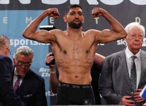 MANCHESTER, ENGLAND - FEBRUARY 18: Amir Khan stands on the scales during the official weigh-in at Manchester Central Convention Complex ahead of his fight against Kell Brook on February 18, 2022 in Manchester, England. (Photo by Alex Livesey/Getty Images)