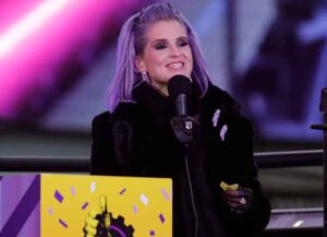 NEW YORK, NEW YORK – DECEMBER 31: Kelly Osbourne reads confetti notes live from Times Square during 2021 New Year’s Eve celebrations on December 31, 2020 in New York City. (Photo by Gary Hershorn-Pool/Getty Images)