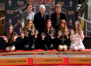 HOLLYWOOD, CALIFORNIA - JUNE 21: (Top L-R) Steve Binder, Baz Luhrmann, Austin Butler, (Bottom L-R) Harper Vivienne Ann Lockwood, Lisa Marie Presley, Priscilla Presley, Riley Keough, and Finley Aaron Love Lockwood attend the Handprint Ceremony honoring Priscilla Presley, Lisa Marie Presley And Riley Keough at TCL Chinese Theatre on June 21, 2022 in Hollywood, California. (Photo by Jon Kopaloff/Getty Images)Baz Luhrmann, Austin Butler, (Bottom L-R) Harper Vivienne Ann Lockwood, Lisa Marie Presley, Priscilla Presley, Riley Keough,