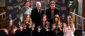 HOLLYWOOD, CALIFORNIA - JUNE 21: (Top L-R) Steve Binder, Baz Luhrmann, Austin Butler, (Bottom L-R) Harper Vivienne Ann Lockwood, Lisa Marie Presley, Priscilla Presley, Riley Keough, and Finley Aaron Love Lockwood attend the Handprint Ceremony honoring Priscilla Presley, Lisa Marie Presley And Riley Keough at TCL Chinese Theatre on June 21, 2022 in Hollywood, California. (Photo by Jon Kopaloff/Getty Images)Baz Luhrmann, Austin Butler, (Bottom L-R) Harper Vivienne Ann Lockwood, Lisa Marie Presley, Priscilla Presley, Riley Keough,