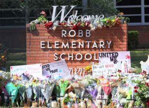 UVALDE, TEXAS - MAY 27: A memorial for victims of Tuesday's mass shooting at Robb Elementary School is seen on May 27, 2022 in Uvalde, Texas. Steven C. McCraw, Director and Colonel of the Texas Department of Public Safety, held a press conference to give an update on the investigation into Tuesday's mass shooting where 19 children and two adults were killed at Robb Elementary School, and admitted that it was the wrong decision to wait and not breach the classroom door as soon as police officers were inside the elementary school. (Photo by Michael M. Santiago/Getty Images)