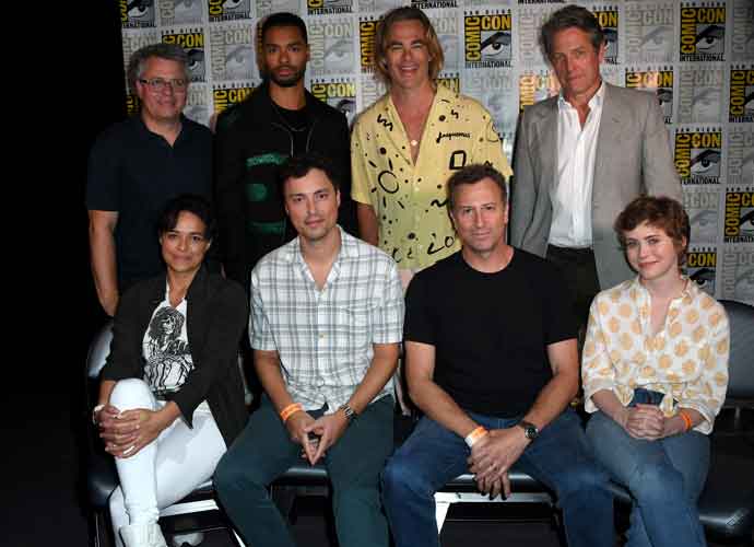 SAN DIEGO, CALIFORNIA - JULY 21: (Back, L-R) Jeremy Latcham, Regé-Jean Page, Chris Pine, Hugh Grant, (front, L-R) Michelle Rodriguez, John Francis Daley, Jonathan Goldstein, and Sophia Lillis pose at the 