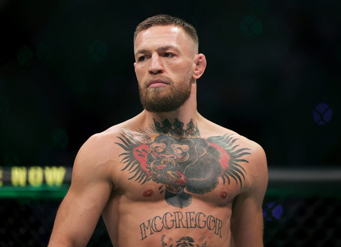 Conor McGregor Arrested For Dangerous Driving, $184,000 Bentley Seized Full view LAS VEGAS, NEVADA - JULY 10: Conor McGregor of Ireland walks in the octagon before his lightweight bought against :Dustin Poirier during UFC 264: Poirier v McGregor 3 at T-Mobile Arena on July 10, 2021 in Las Vegas, Nevada. (Photo by Stacy Revere/Getty Images)
