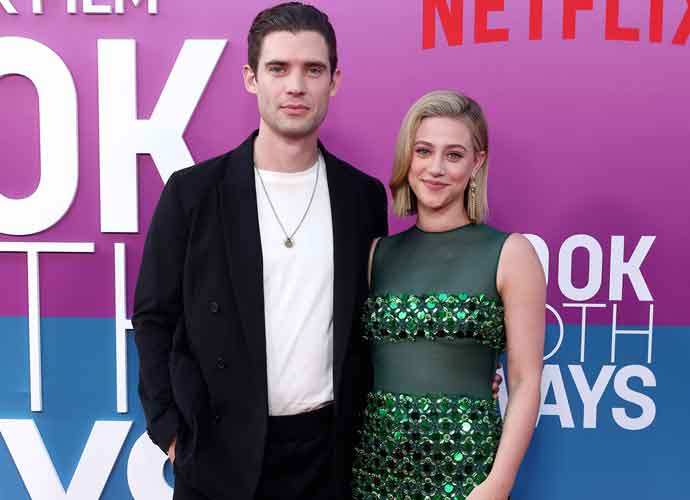 HOLLYWOOD, CALIFORNIA - AUGUST 16: (L-R) Lili Reinhart and David Corenswet attend the Los Angeles Premiere of Netflix's 