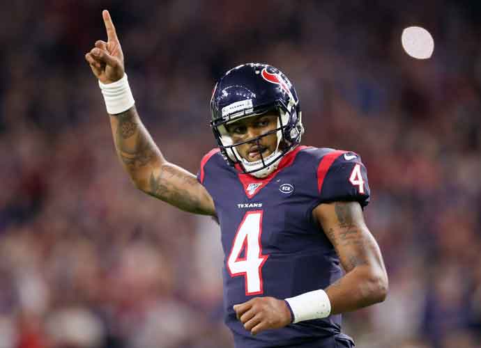 HOUSTON, TEXAS - JANUARY 04: Deshaun Watson #4 of the Houston Texans celebrates a touchdown pass against the Buffalo Bills during the fourth quarter of the AFC Wild Card Playoff game at NRG Stadium on January 04, 2020 in Houston, Texas. (Photo by Christian Petersen/Getty Images)