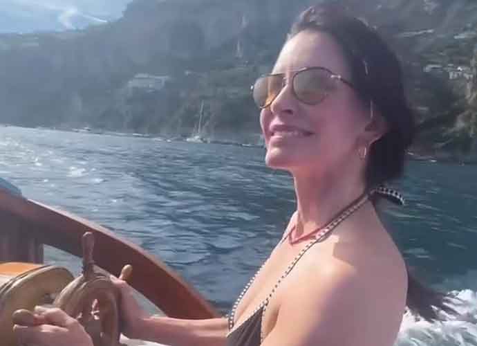 Courteney Cox sports bikini on Italian boat trip with with boyfriend Johnny McDaid (Image: Instagram)