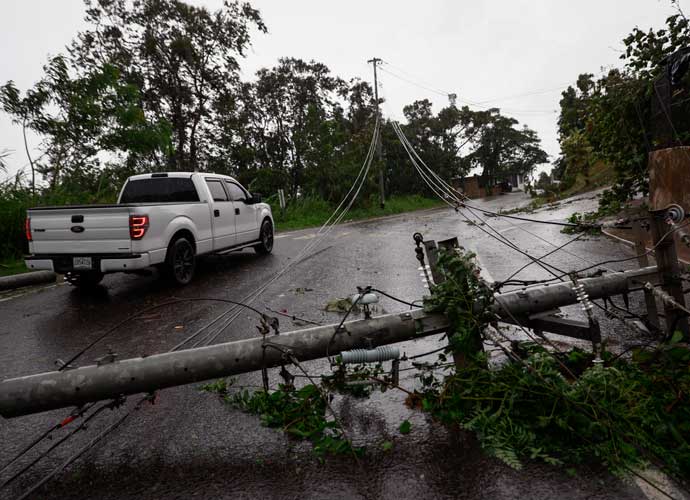 CAYEY, PUERTO RICO - SEPTEMBER 19: Downed power lines on road PR-743 in Cayey ,Puerto Rico as the island awoke to a general power outage on September 19, 2022 in San Juan, Puerto Rico. Hurricane Fiona struck this Caribbean nation causing extensive damages related to flooding after many towns in the mountainous and southern region received in some cases over twenty inches of rain. (Photo by Jose Jimenez/Getty Images)