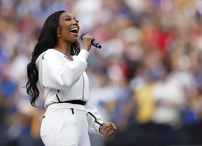 INGLEWOOD, CALIFORNIA - JANUARY 30: Singer Brandy performs the national anthem before the NFC Championship Game between the Los Angeles Rams and the San Francisco 49ers at SoFi Stadium on January 30, 2022 in Inglewood, California. (Photo by Christian Petersen/Getty Images)