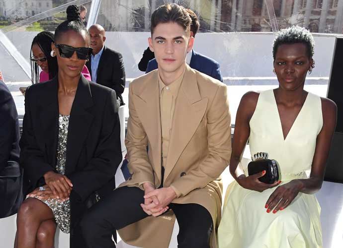 LONDON, ENGLAND - OCTOBER 10: (L to R) Letitia Wright, Hero Fiennes-Tiffin and Sheila Atim attend the Alexander McQueen SS23 Womenswear show at the Old Royal Naval College on October 11, 2022 in Greenwich, England. (Photo by David M. Benett/Dave Benett/Getty Images for Alexander McQueen)