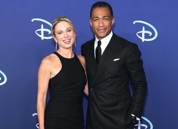 NEW YORK, NEW YORK - MAY 17: Amy Robach and TJ Holmes attend the 2022 ABC Disney Upfront at Basketball City - Pier 36 - South Street on May 17, 2022 in New York City. (Photo by Dia Dipasupil/Getty Images,)