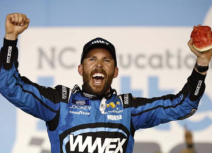 CONCORD, NORTH CAROLINA - MAY 27: Ross Chastain, driver of the #41 Worldwide Express Chevrolet, celebrates in victory lane after winning the NASCAR Camping World Truck Series North Carolina Education Lottery 200 at Charlotte Motor Speedway on May 27, 2022 in Concord, North Carolina. (Photo by Jared C. Tilton/Getty Images)
