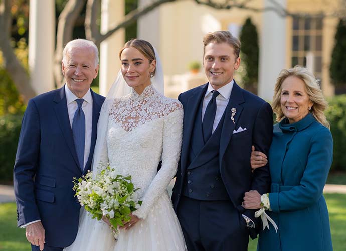 Joe & Jill Biden embrace Naomi Biden & Peter Neal at their wedding (Image: White House)