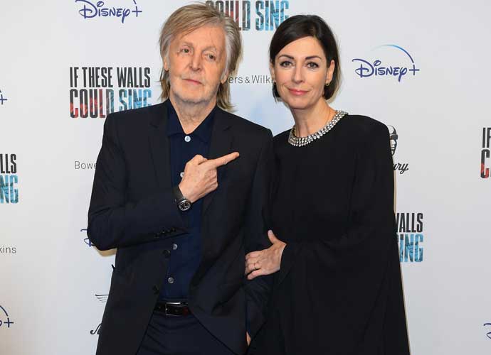 LONDON, ENGLAND - DECEMBER 12: Sir Paul McCartney and Mary McCartney arrive at the UK premiere of 