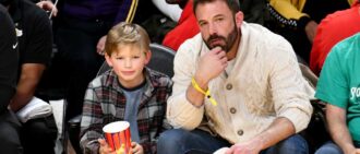 LOS ANGELES, CALIFORNIA - DECEMBER 13: Ben Affleck and his son Samuel Garner Affleck attend a basketball game between the Los Angeles Lakers and the Boston Celtics at Crypto.com Arena on December 13, 2022 in Los Angeles, California. (Photo by Allen Berezovsky/Getty Images)