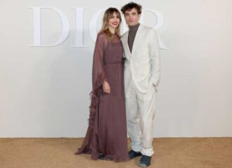 CAIRO, EGYPT - DECEMBER 03: Suki Waterhouse and Robert Pattinson attend the Dior Fall 2023 Menswear Collection on December 03, 2022 in Cairo, Egypt. (Photo by Pascal Le Segretain/Getty Images For Christian Dior)