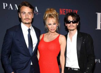 HOLLYWOOD, CALIFORNIA - JANUARY 30: (L-R) Brandon Thomas Lee, Pamela Anderson and Dylan Jagger Lee attend the premiere of Netflix's "Pamela, a love story" at TUDUM Theater on January 30, 2023 in Hollywood, California. (Photo by Jon Kopaloff/Getty Images)