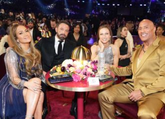 LOS ANGELES, CALIFORNIA - FEBRUARY 05: (L-R) Jennifer Lopez, Ben Affleck, Lauren Hashian, and Dwayne Johnson attend the 65th GRAMMY Awards at Crypto.com Arena on February 05, 2023 in Los Angeles, California. (Photo by Kevin Mazur/Getty Images for The Recording Academy)