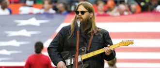 GLENDALE, ARIZONA - FEBRUARY 12: Chris Stapleton performs the national anthem during Super Bowl LVII at State Farm Stadium on February 12, 2023 in Glendale, Arizona. (Photo by Kevin Mazur/Getty Images for Roc Nation)
