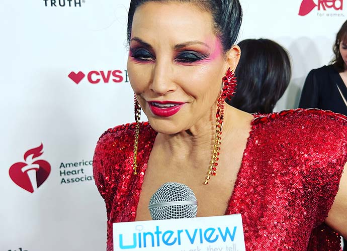 VIDEO EXCLUSIVE: Gina Gershon On How She Stays Looking Young & Healthy At The Red Dress Collection Concert