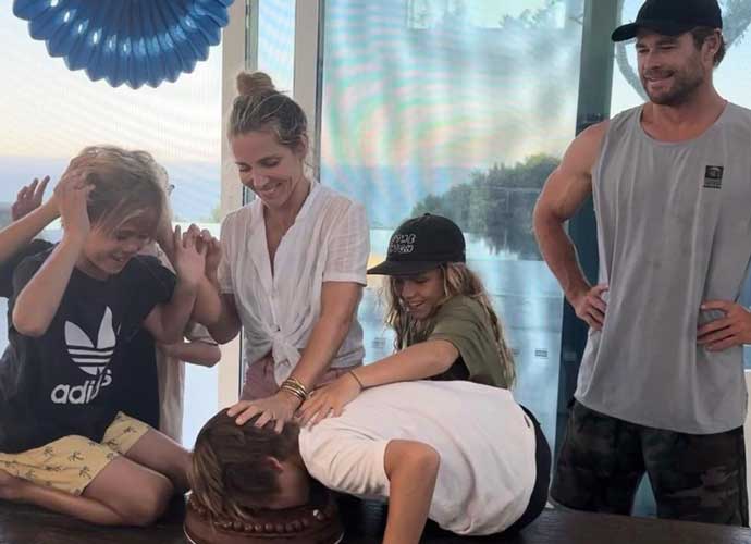 Chris Hemsworth & wife Elsa Pataky celebrity sons' birthday by face planting one into the cake (Image: Instagram)