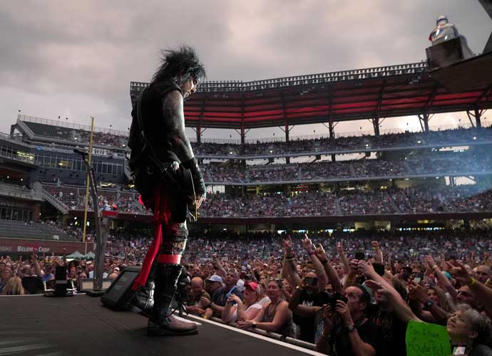 ATLANTA, GEORGIA - JUNE 16: Nikki Sixx of Mötley Crüe performs onstage during The Stadium Tour at Truist Park on June 16, 2022 in Atlanta, Georgia. (Photo by Kevin Mazur/Getty Images for Live Nation)