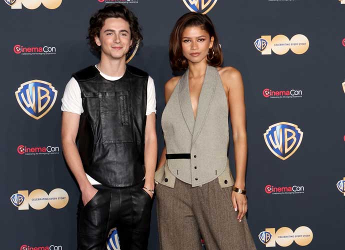 LAS VEGAS, NEVADA - APRIL 25: Timothee Chalamet (L) and Zendaya pose for photos as they promote the upcoming film 