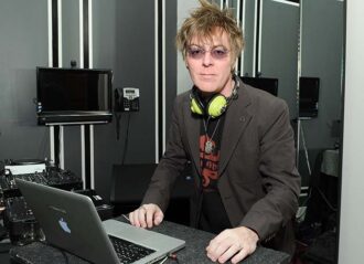 NEW YORK, NY - JANUARY 14: Musician Andy Rourke of The Smiths DJs at the Glenlivet Cellar Collection Experience at Michael Andrews Bespoke on January 14, 2013 in New York City. (Photo by Craig Barritt/Getty Images for The Glenlivet)